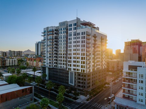 an aerial view of the city at sunset